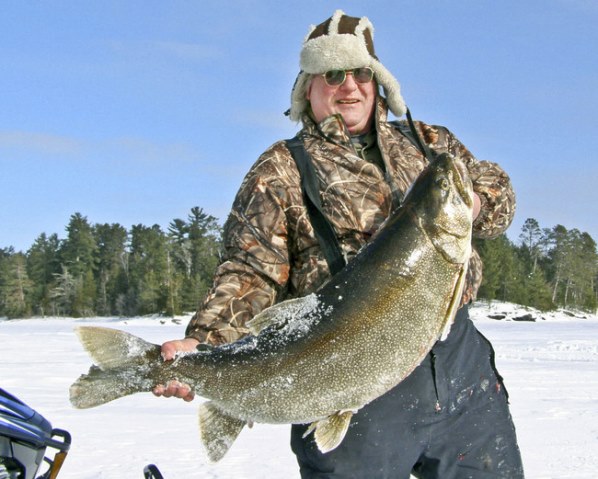 Retired navy captain Rob Scott and his 52-pound, world-record Lake Trout. February 2014